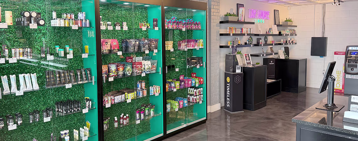 Interior of Nexleaf dispensary showing product display wall and service counter